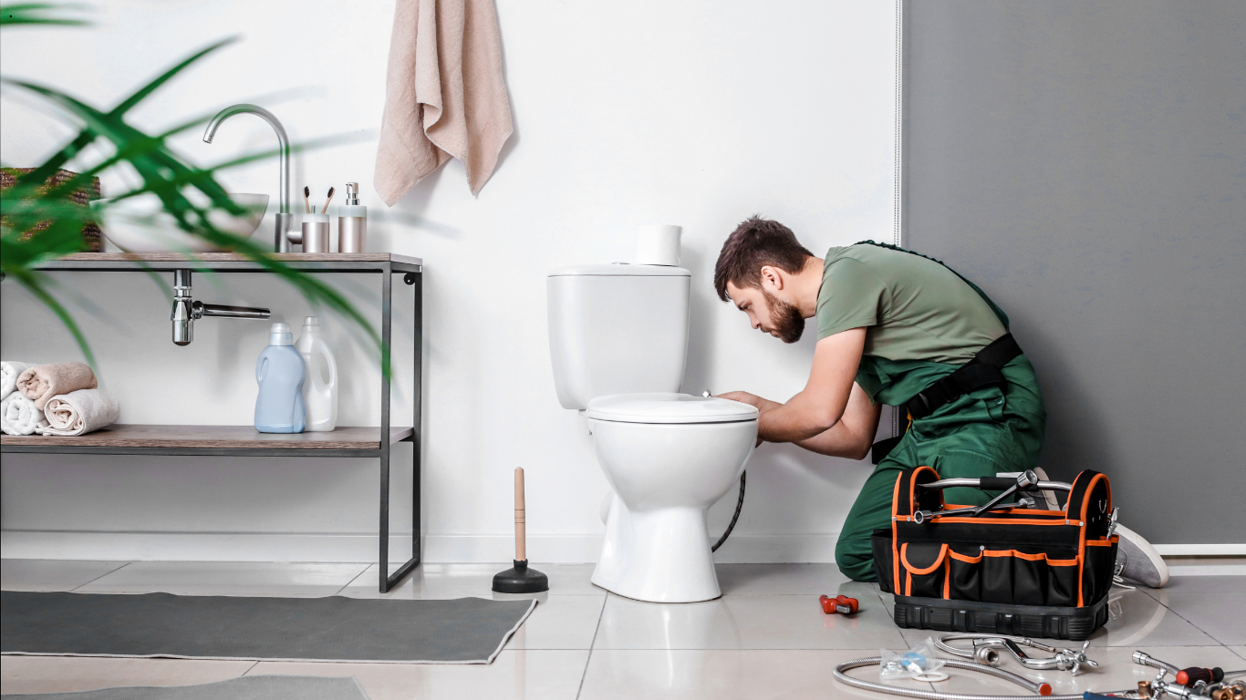 Installer working in a bathroom