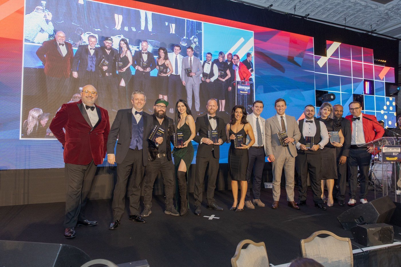 Mark Conacher at the 2022 Great British Entrepreneur Awards Mark Conacher on stage with fellow winners at the 2022 Great British Entrepreneur Awards